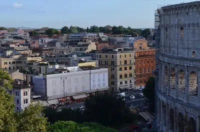 an aerial view of a city with buildings at Domus Chiara al Colosseo in Rome