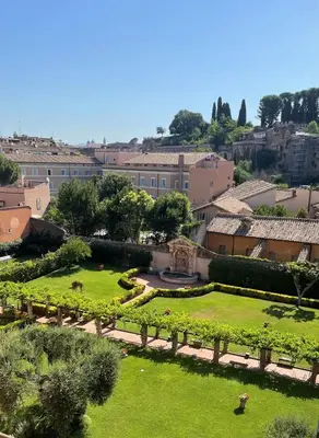 an aerial view of a garden in a city at Palazzo Velabro, a Member of Design Hotels in Rome