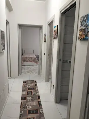 a hallway with a bed in a bedroom at locazione turistica via dei savorelli 120 in Rome