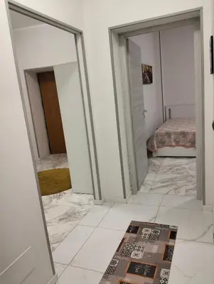 a room with a mirror and a bed at locazione turistica via dei savorelli 120 in Rome