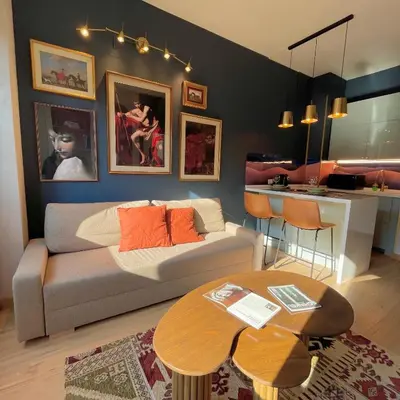 a living room with a couch and a table at E&E Guest House in Rome
