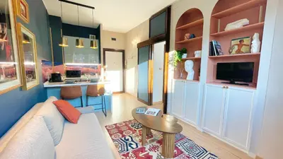 a living room with a couch and a table at E&E Guest House in Rome