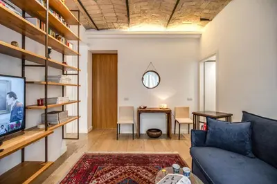 a living room with a couch and a table at PgrHome Borgo Vittorio in Rome