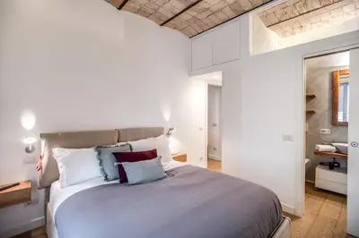a bedroom with a large bed in a room at PgrHome Borgo Vittorio in Rome