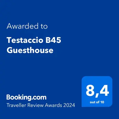 a screenshot of a cell phone with the text awarded to tasacco at Testaccio B45 Guesthouse in Rome