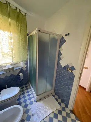 a bathroom with a shower and a toilet at Vicario138 in Rome