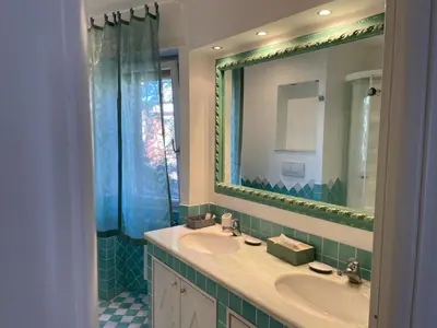 a bathroom with a sink and a mirror at Vicario138 in Rome