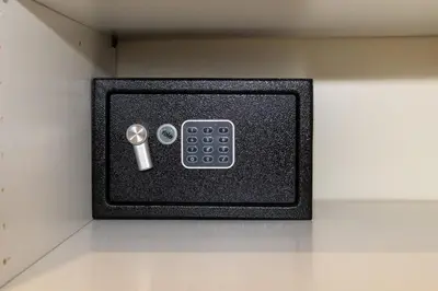 a safe with a remote control on a wall at Pigneto Vannini Roma in Rome