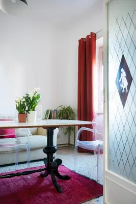 a living room with a table and a couch at Myway RDR Apartment in Rome
