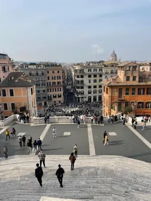 a group of people walking around a city at Residenza Clodio Spanish Steps in Rome