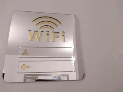 an wifi alarm box with a wifi logo on it at Casina Tiberina Suite in Rome