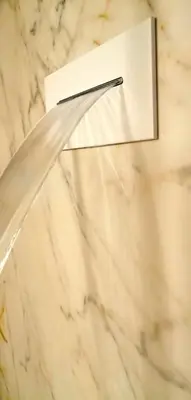 a white marble counter top with a paper on it at Trastevere Boutique with Gym and Steam Shower in Rome