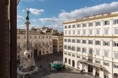 a view from a window of a city with buildings at HospitalityRome Piazza di Spagna View in Rome