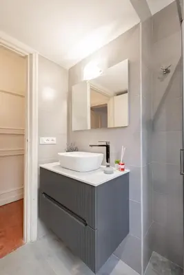 a bathroom with a sink and a shower at Campo de' Fiori appartamento via di Grotta Pinta in Rome