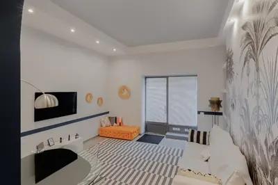 a living room with a couch and a fireplace at Navona Harmony Apartments in Rome