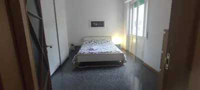a small bedroom with a bed in a hallway at Your comfy Home in Rome