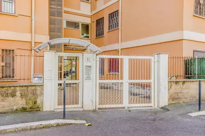 a gate in front of a building at MARCONI31Eredia in Rome