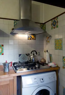 a kitchen with a stove and a stove top oven at Angel's Terrace in Rome