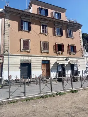 a large building on the side of a street at StarHome San Paolo in Rome