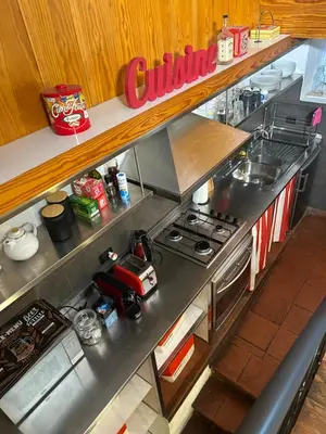 a model of a kitchen with a counter top at Garden House Trastevere in Rome