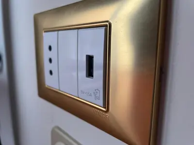 a light switch is on a wall at Casa Alessi in Rome elegant, spacious and comfortable apartment in Rome