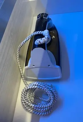 a close up of a phone with a rope around it at Attico Loft con terrazza Vía dei Coronari - Roma in Rome