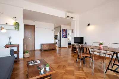 a living room with a table and a dining room at Matilde's view apartment Saint Peter in Rome