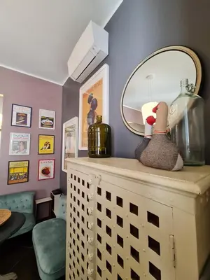 a dressing room with a mirror and a dresser at Amina's House Lab in Rome