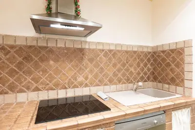 a kitchen with a sink and a stove at Trastevere Home by Rental in Rome in Rome