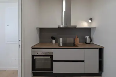 a kitchen with a stove and a counter top at Matilda Charme in Rome