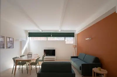 a living room with a couch and a table at Matilda Charme in Rome