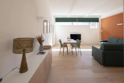 a living room with a couch and a table at Matilda Charme in Rome