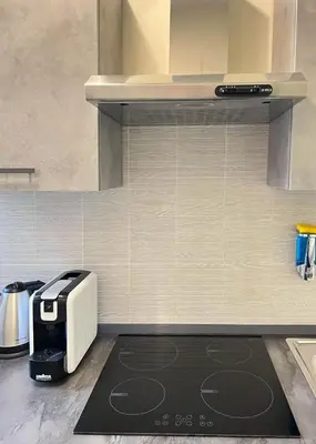 a kitchen with a toaster sitting on a counter at suite magenta in Rome