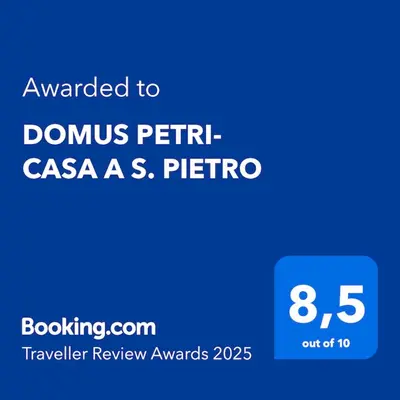 a screenshot of a phone with the text awarded to domus petrett casas at DOMUS PETRI- CASA A S. PIETRO in Rome