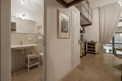 a bathroom with a sink and a toilet at Shabby Loft in Colosseum in Rome