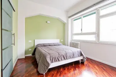 a bedroom with a bed and a window at [Vaticano * * * * *] - Luxury Flat in Rome