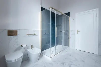 a bathroom with a toilet and a glass shower at Be Mate Piazza Navona in Rome