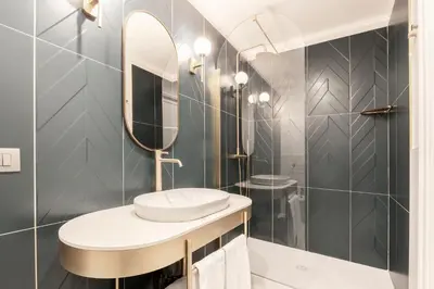 a bathroom with a sink and a mirror at Be Mate Piazza Navona in Rome