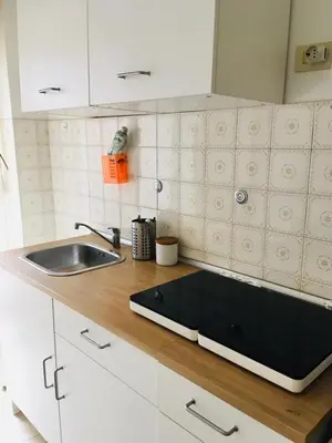 a kitchen with a sink and a counter top at La mia casa di Roma in Rome
