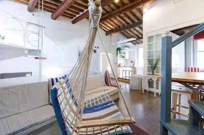 a room with a hammock in a house at Pantheon Loft - B in Rome