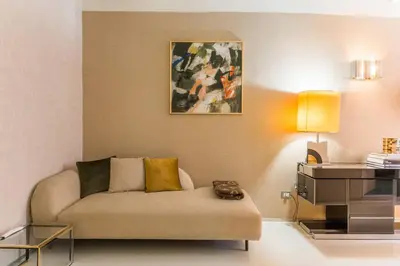 a living room with a couch and a table at My Trastevere Suite in Rome