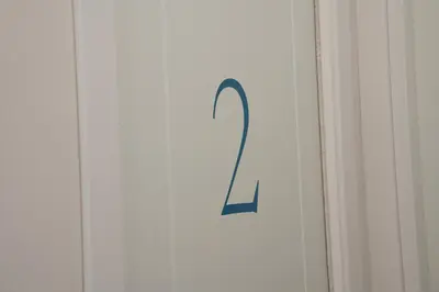 a door with a number one on the side of it at Dielle Apartments ROMA in Rome