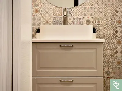 a white cabinet with a sink in a bathroom at RomeSweetRome in Rome