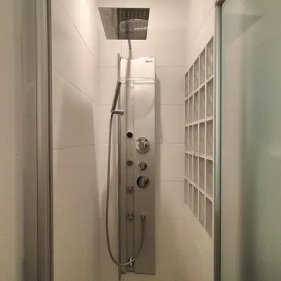 a shower in a bathroom with a glass door at Appartamento Musei Vaticani in Rome