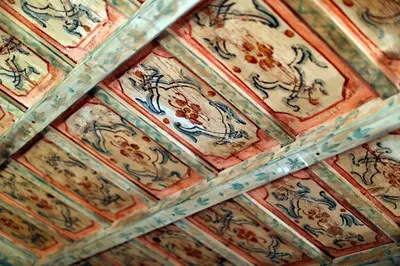 a close up of a ceiling with patterns on it at Decor Inspiration Apartment in Rome
