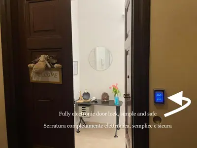 a room with a door with a stuffed animal on it at Cosmo GuestHouse in Rome