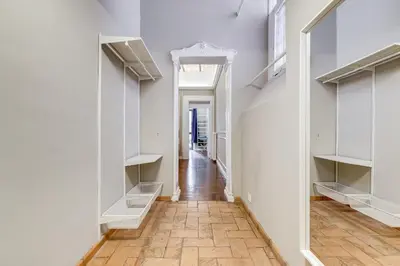 a hallway with white shelving and a hallway with a hallway at SPANISH GARDEN in Rome