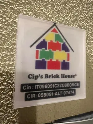 a sign for a brick house on a wall at Cip's Brickhouse in Rome