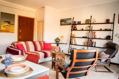 a living room with a couch and a table at Casa Marta in Rome