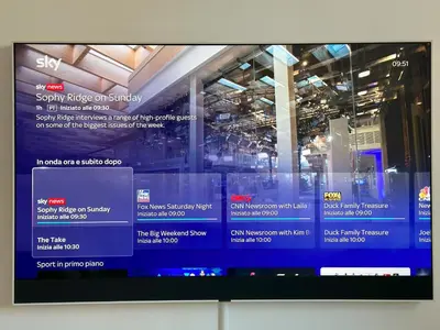 a television screen with a website on it at Royal Domus Of Rome in Rome